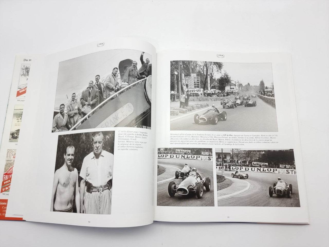 Racing photo book, open spread with black-and-white car race photos and portraits