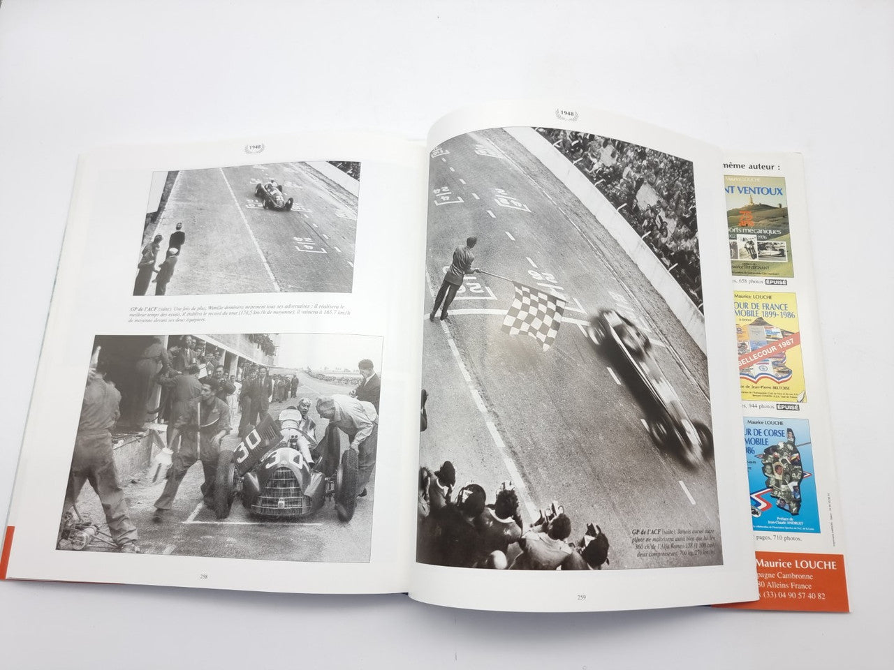 Racing photo book, open spread with black-and-white track and pit lane photos