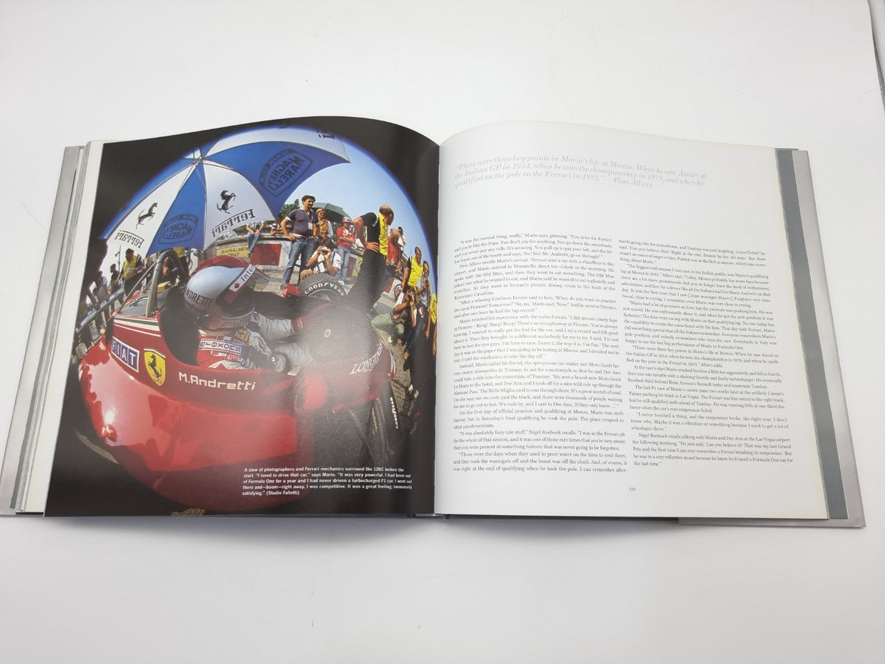 Open motorsport book with circular racing collage image and paragraph text on the right.