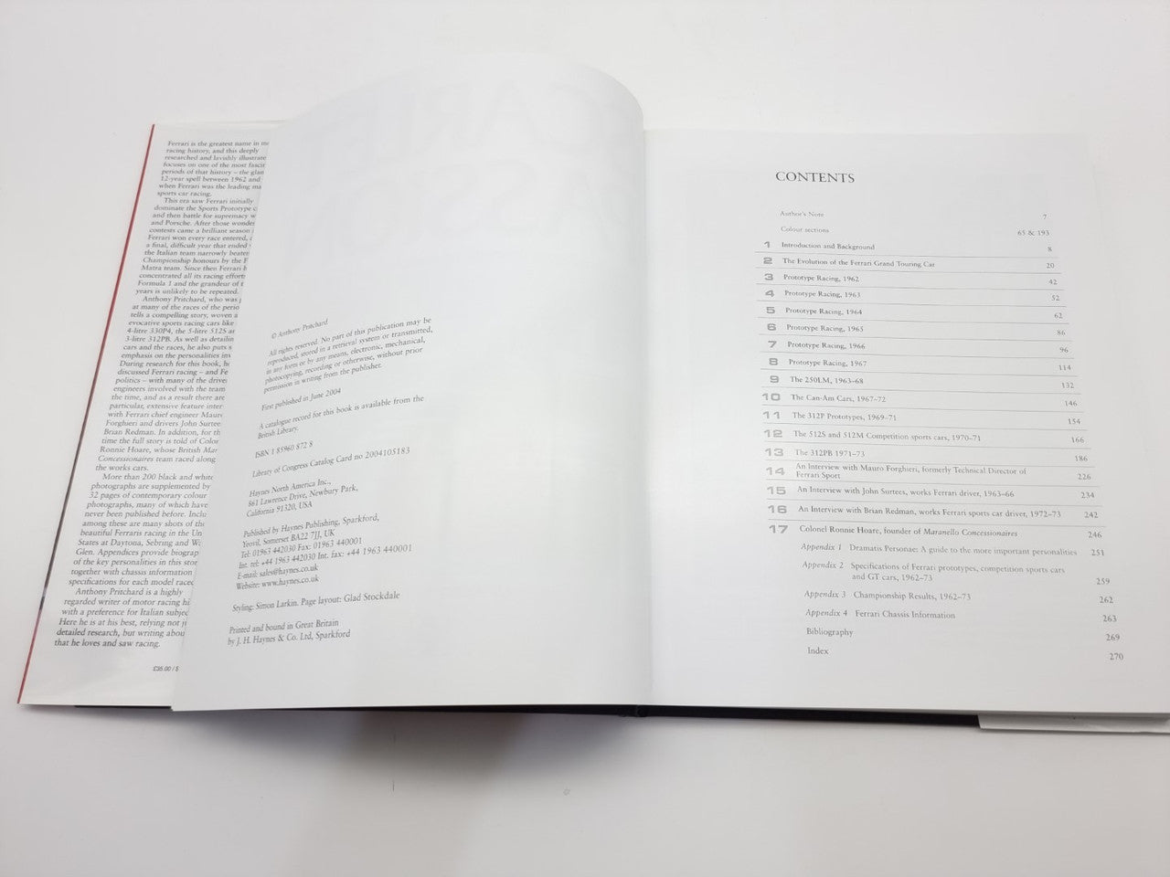 Open book spread with dense text pages and numbered contents on right