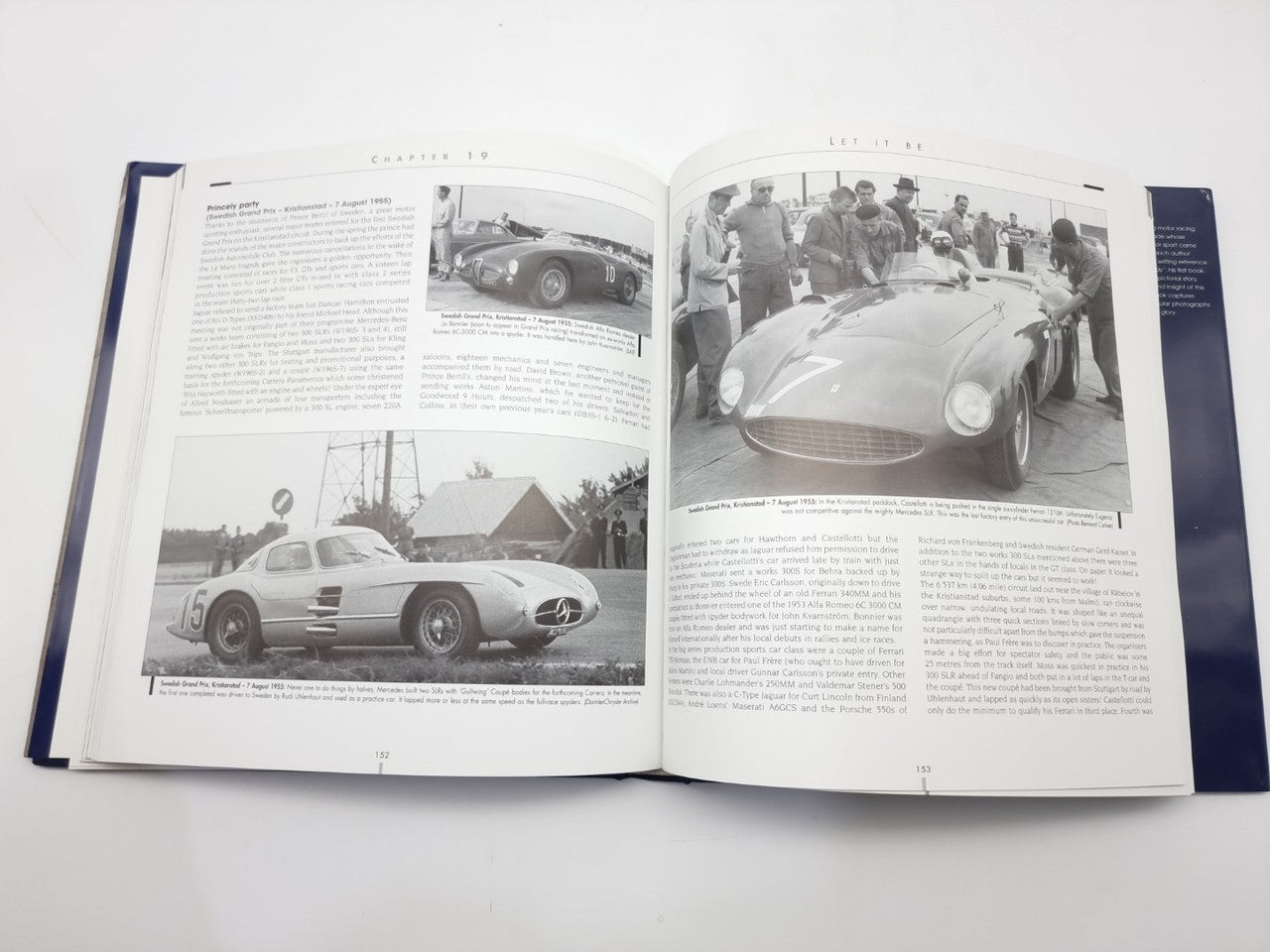 Open photo book spread with close-up vintage race car photo and captions