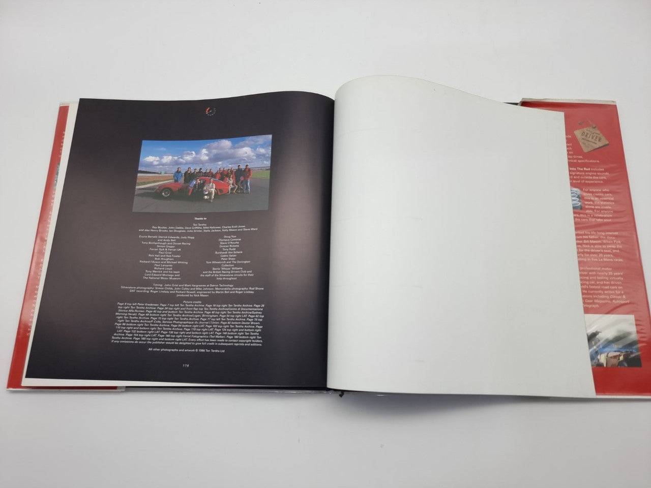 Open hardcover book with a small race photo and a list-style text layout on the left