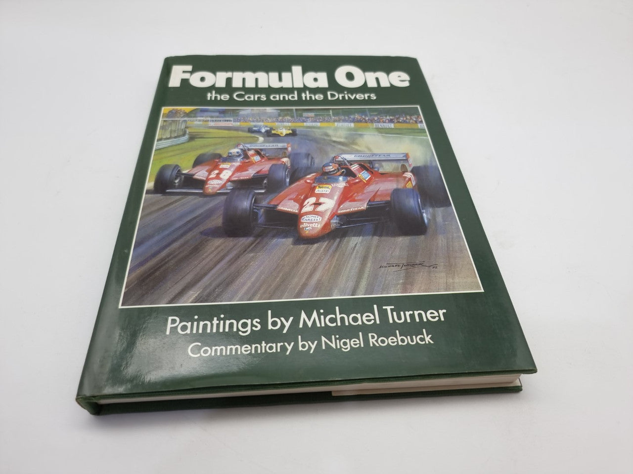 SIGNED Formula One art book cover with racing cars and drivers illustration