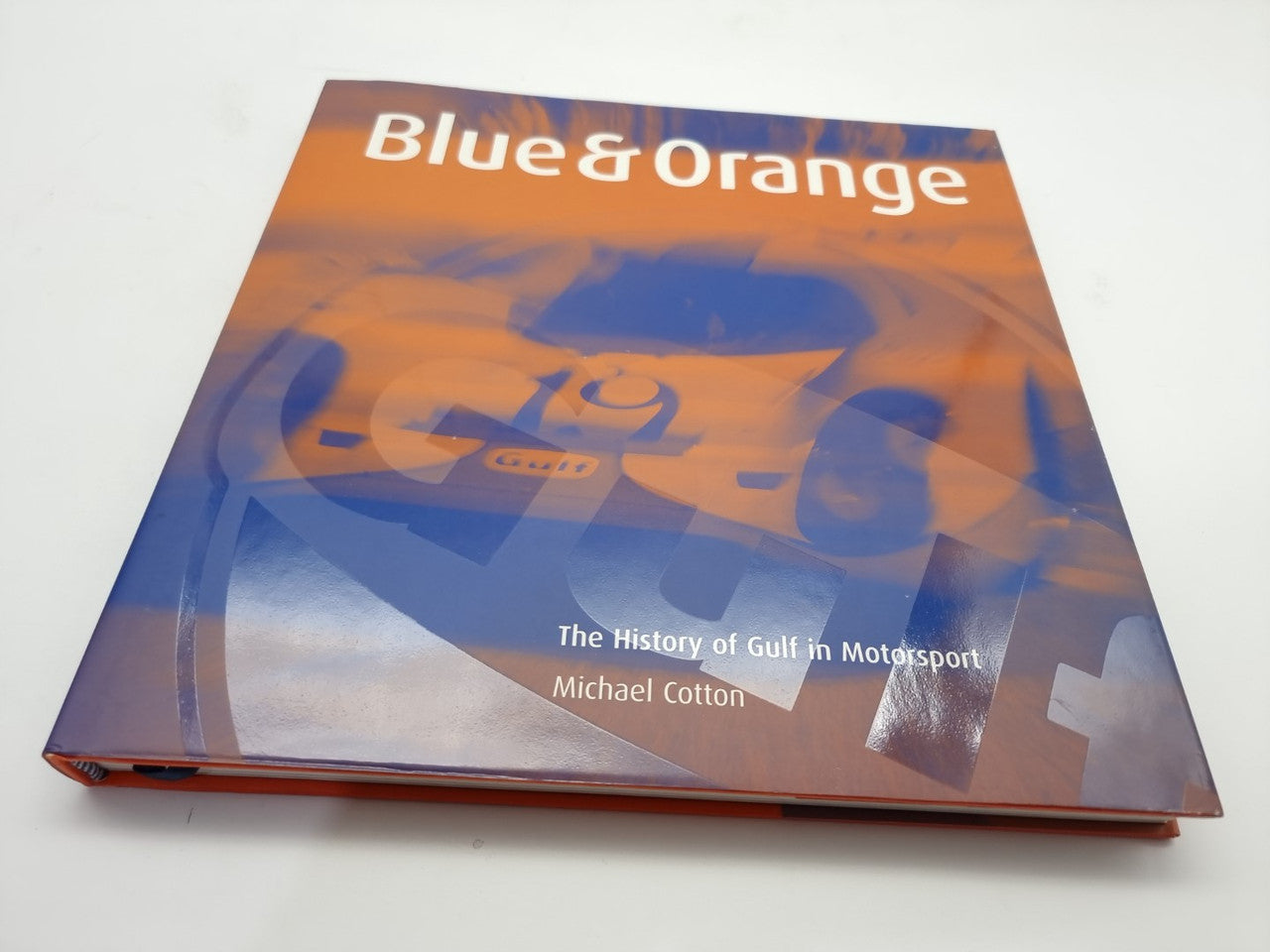 Blue and Orange The History of Gulf in Motorsport (Signed Derek Bell, M. Cotton, 2004)
