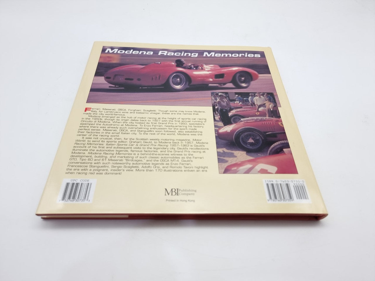 Paperback racing memories book back cover with photos, barcode, and publisher logo