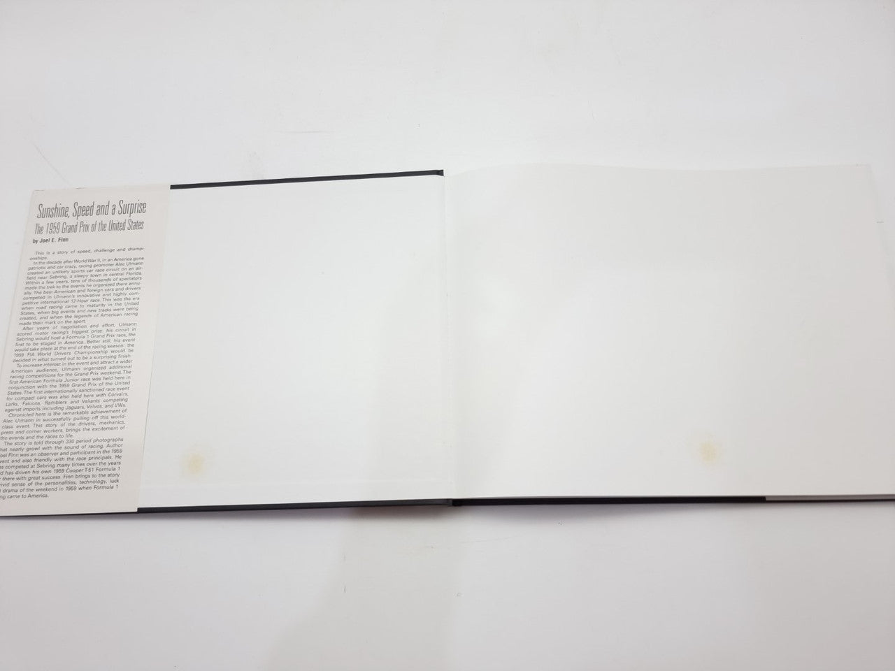 Open racing book spread with columns of printed text
