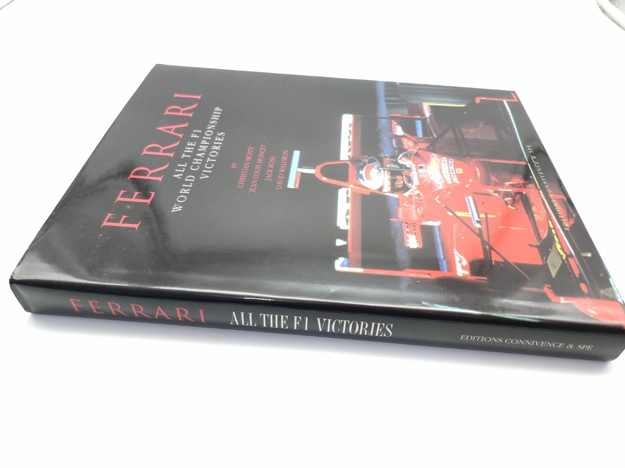 Ferrari F1 victories hardcover, closed cover with Ferrari logo and racing image