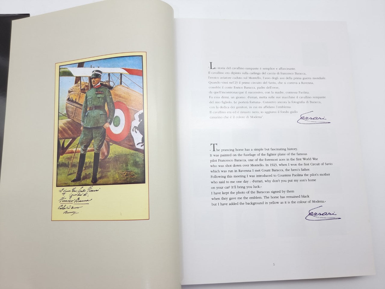 Ferrari F1 victories book, open pages with illustrated portrait left and text right