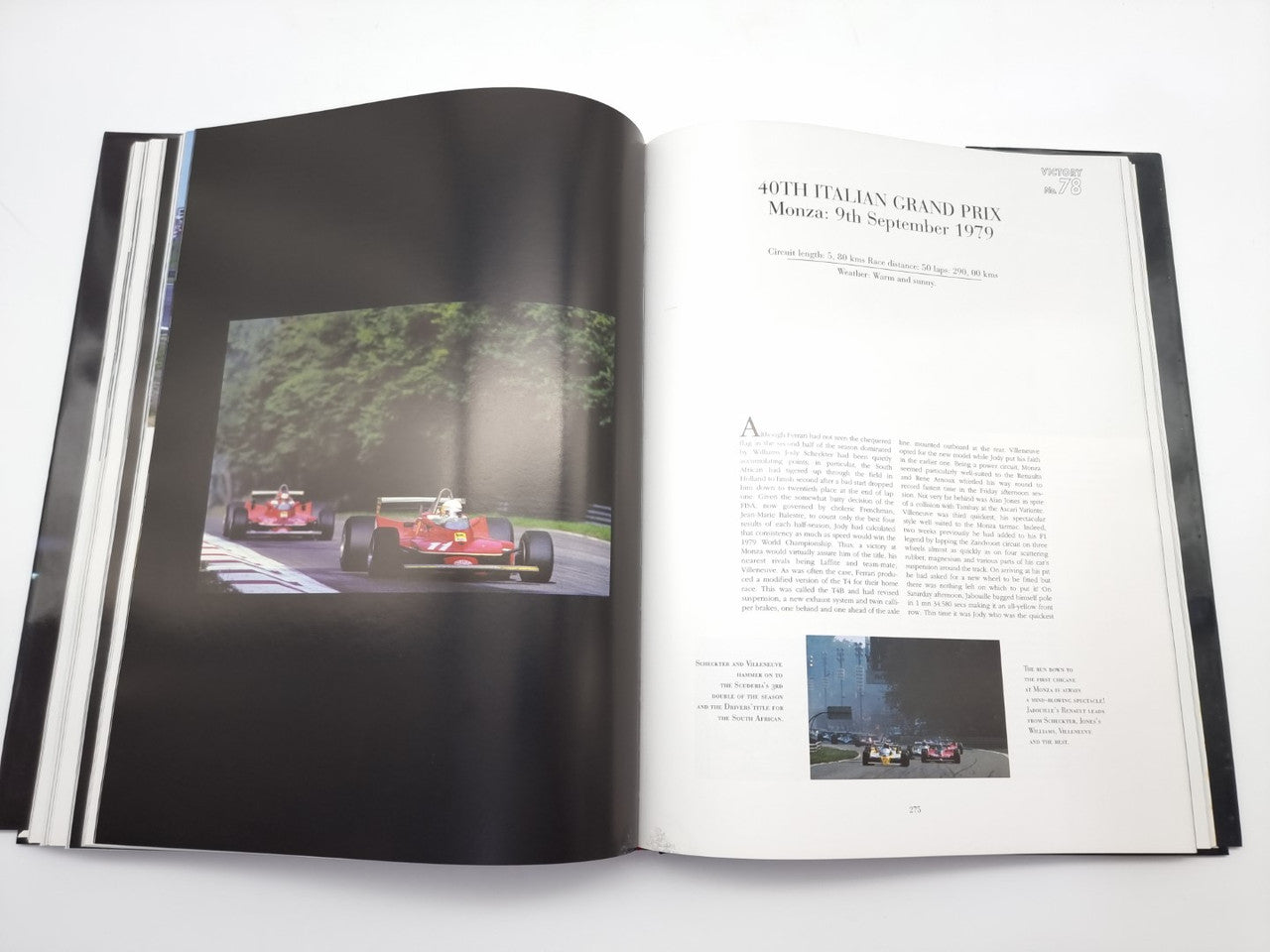 Open motorsport book with a track race photo and column of descriptive text
