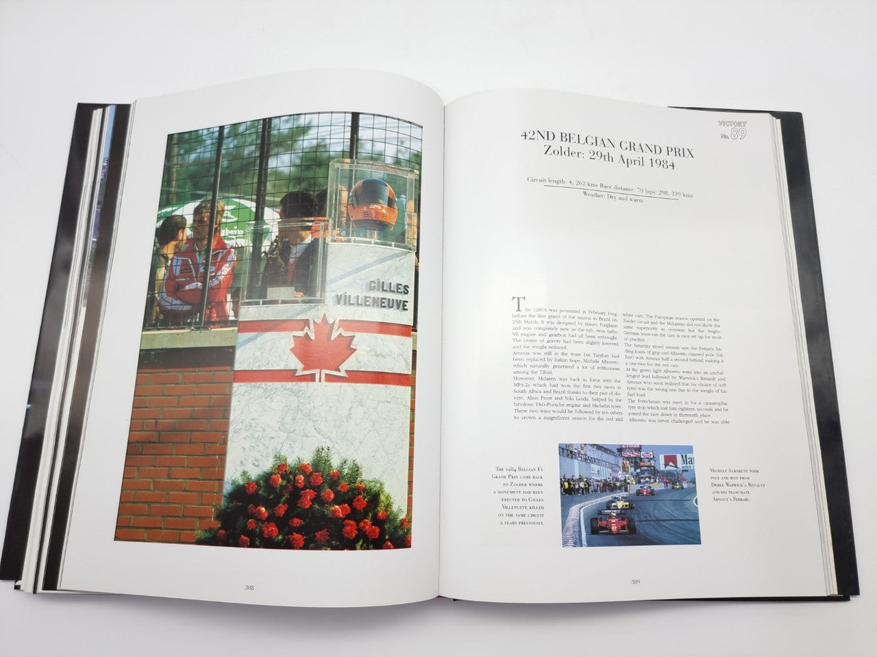Open motorsport book with Canadian-flag race article and photo collage pages