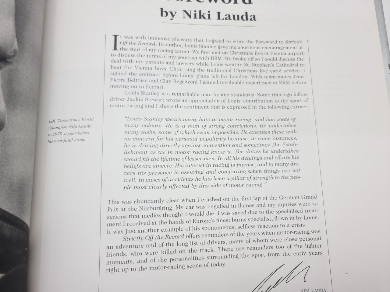 Racing history book forward page close-up with printed text and signature