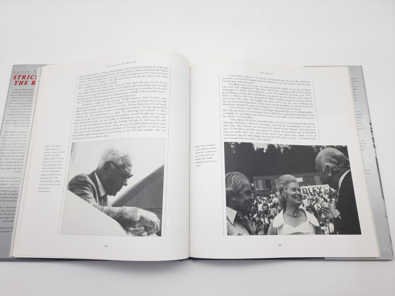Open book with two black-and-white photos and surrounding printed text
