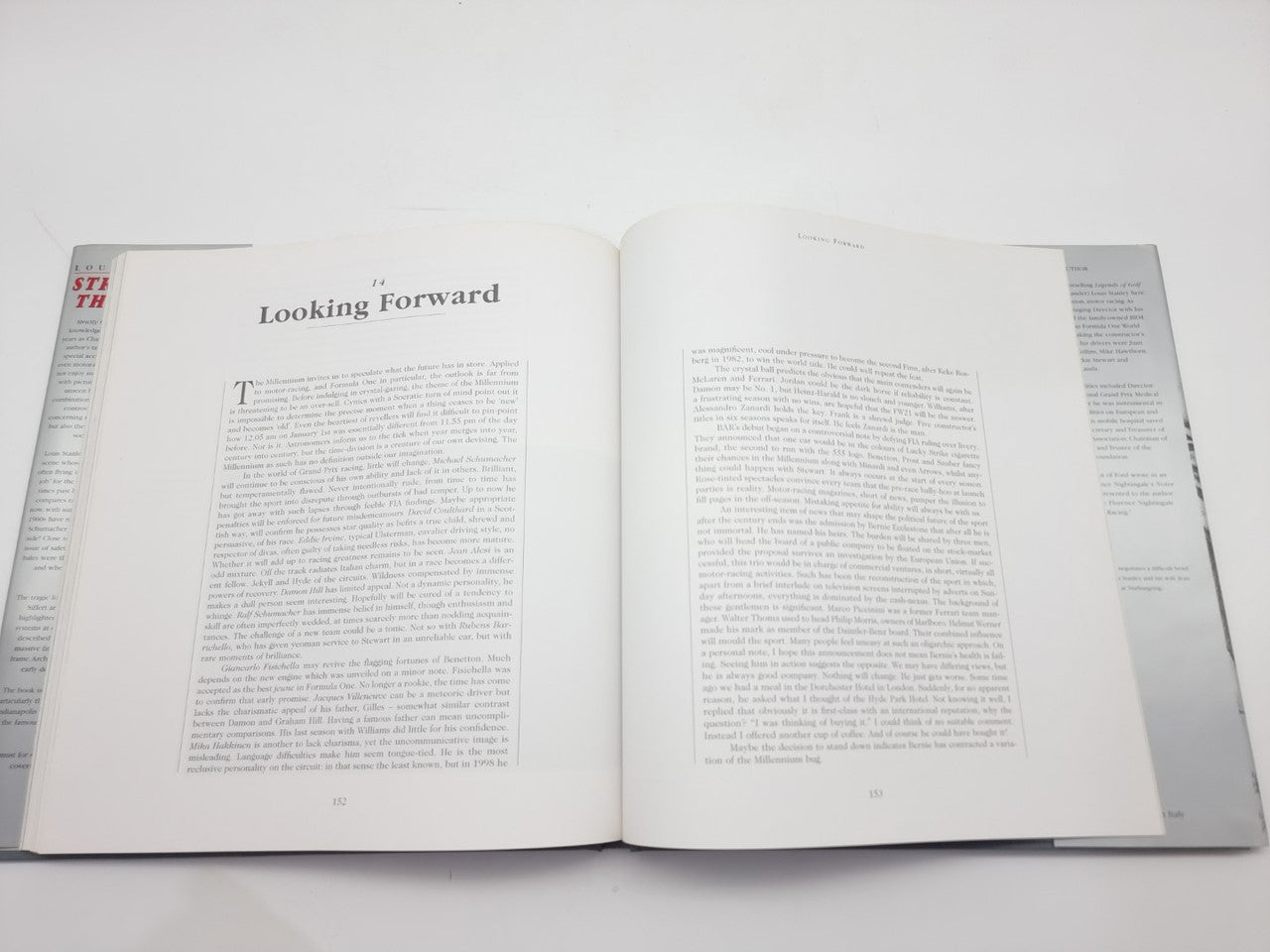 Open book with two facing pages of printed text and section headings