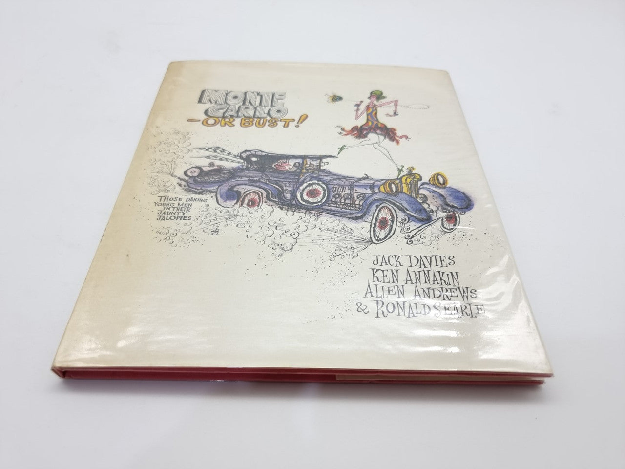 Vintage illustrated book cover with blue car illustration and title lettering.