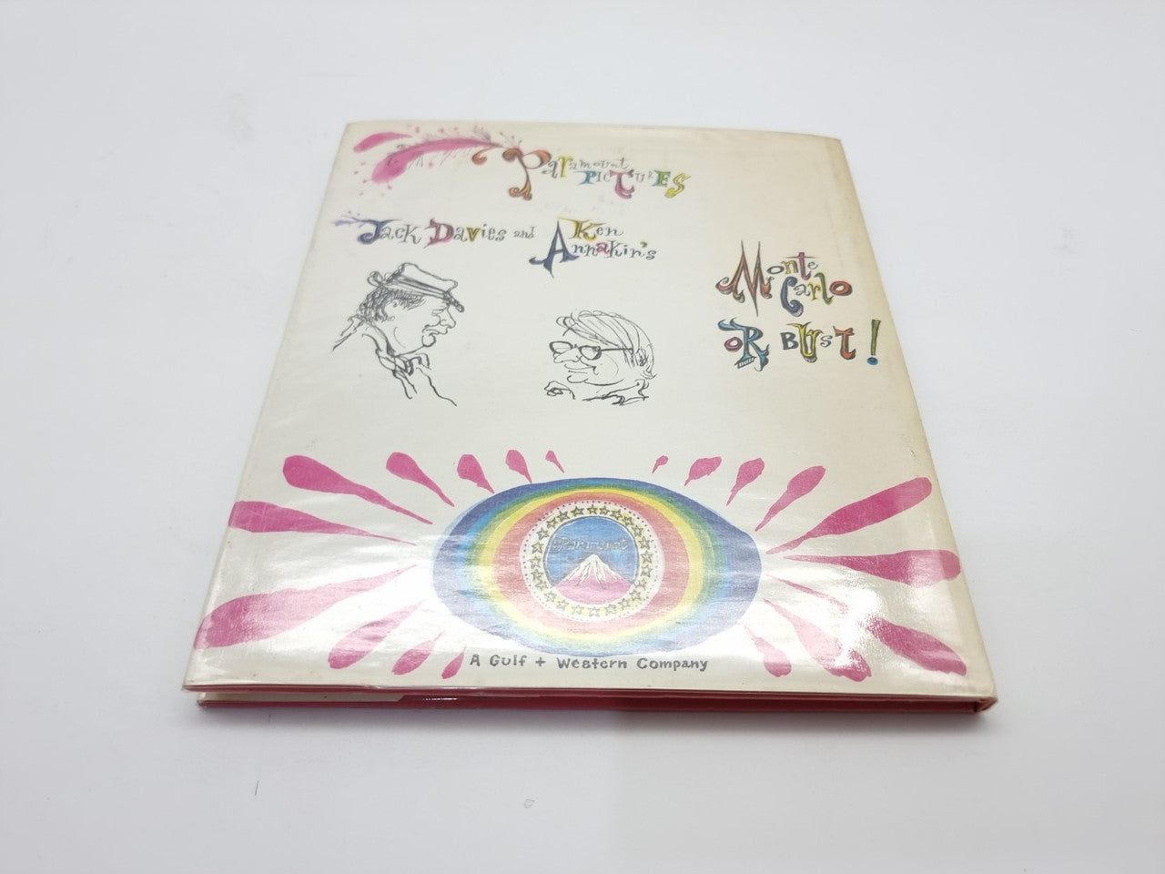 Vintage illustrated book cover with rainbow portal graphic and hand-drawn sketches.