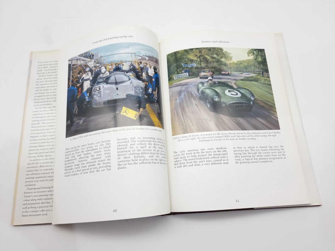Racing cars drawing and painting book open to racing photo pages