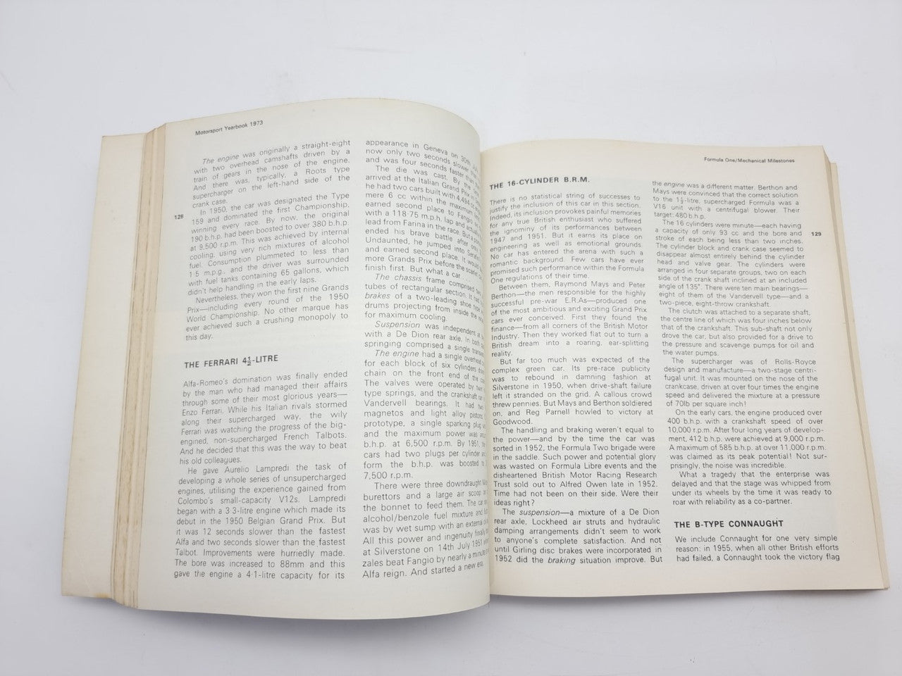 1973 motorsport yearbook open to two pages of detailed race listings.