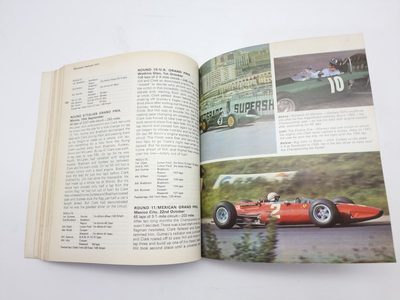 1973 motorsport yearbook open, left text list and right photo race spread.