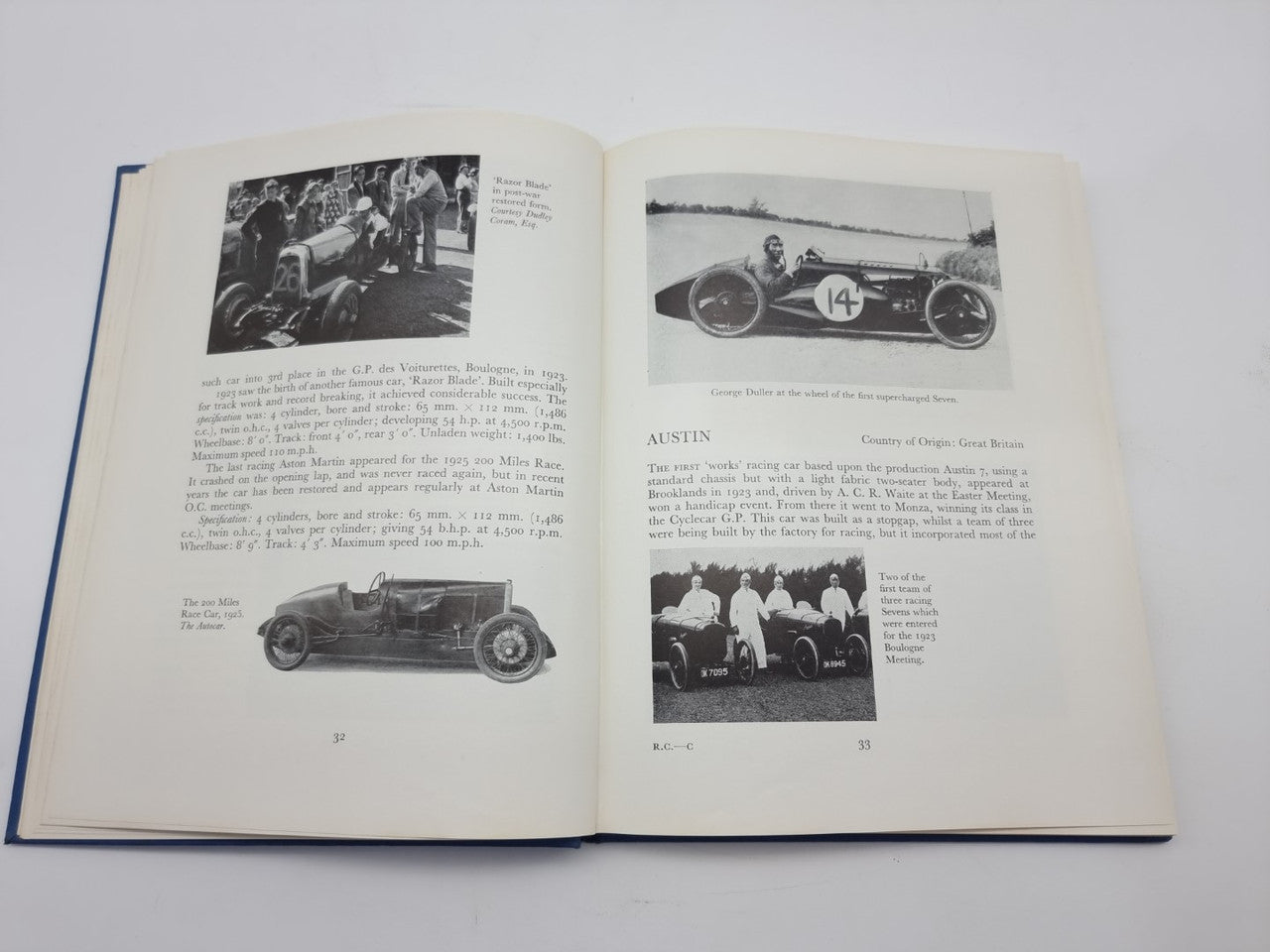 Open book spread featuring black-and-white race car images and caption blocks