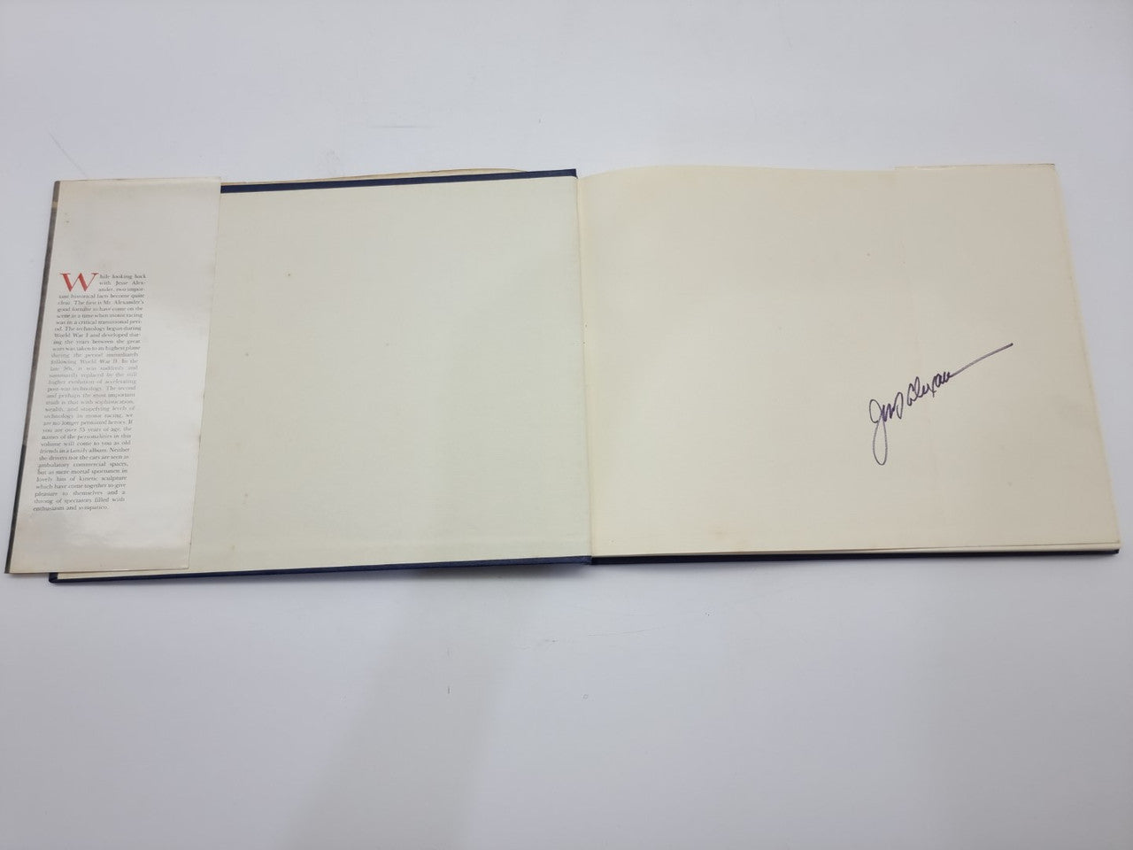 Signed open book with handwritten signature on right page