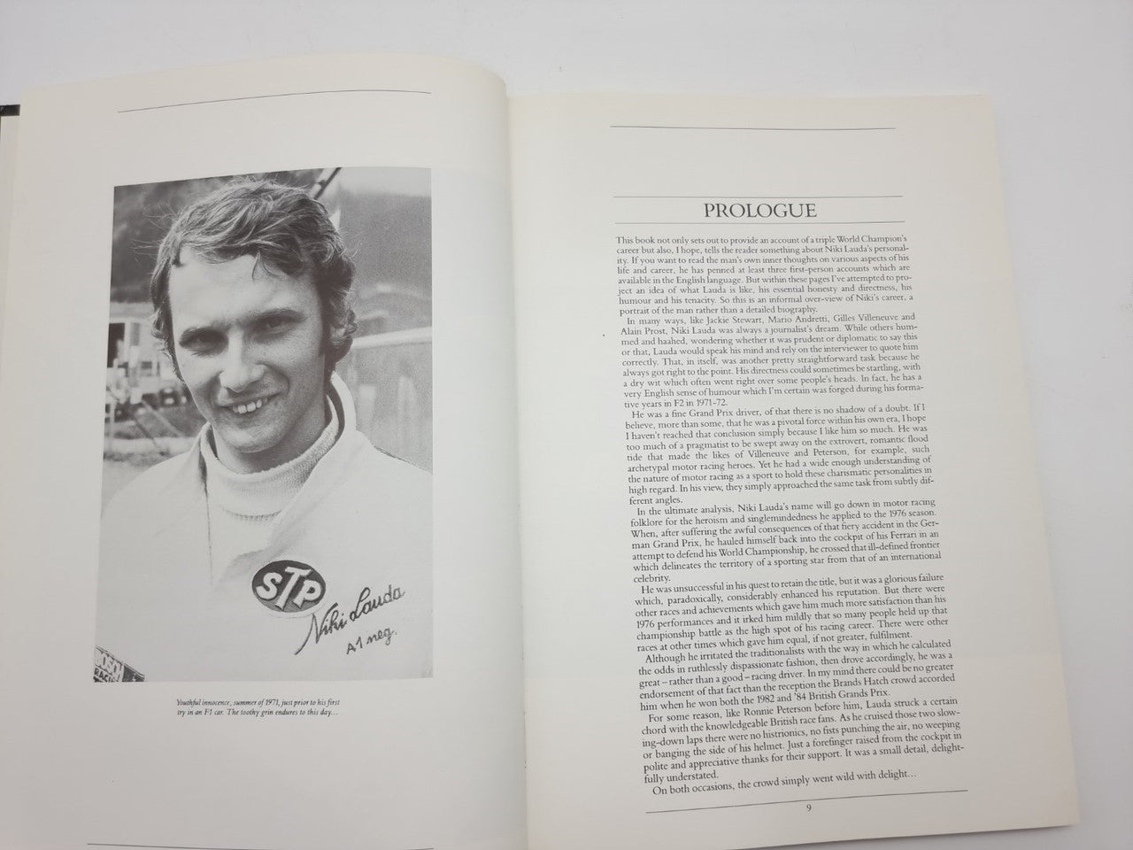 Motorsport book opened to portrait photo and section titled "PROLOGUE"