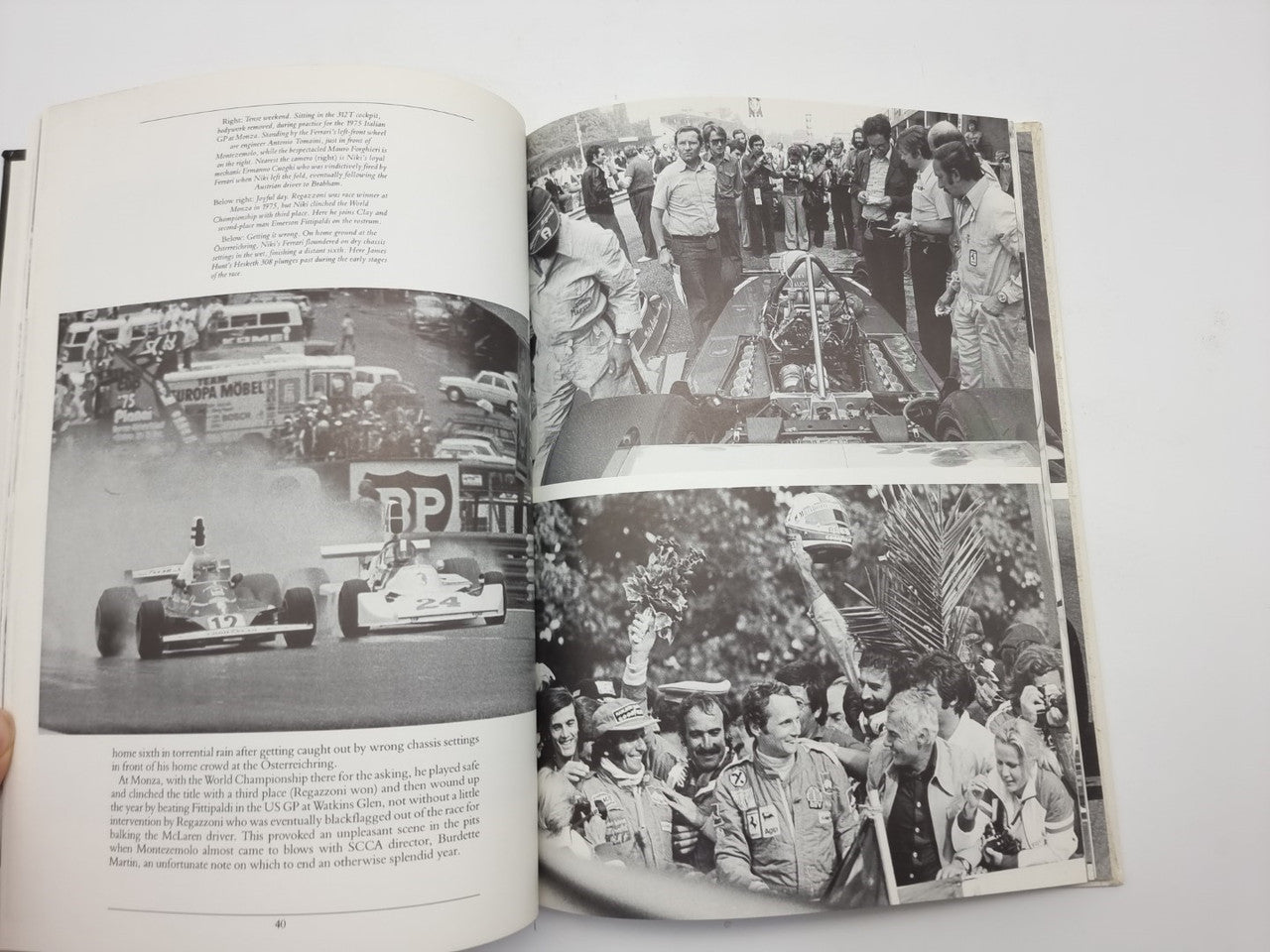 Motorsport book opened to spread with black-and-white race photos and text