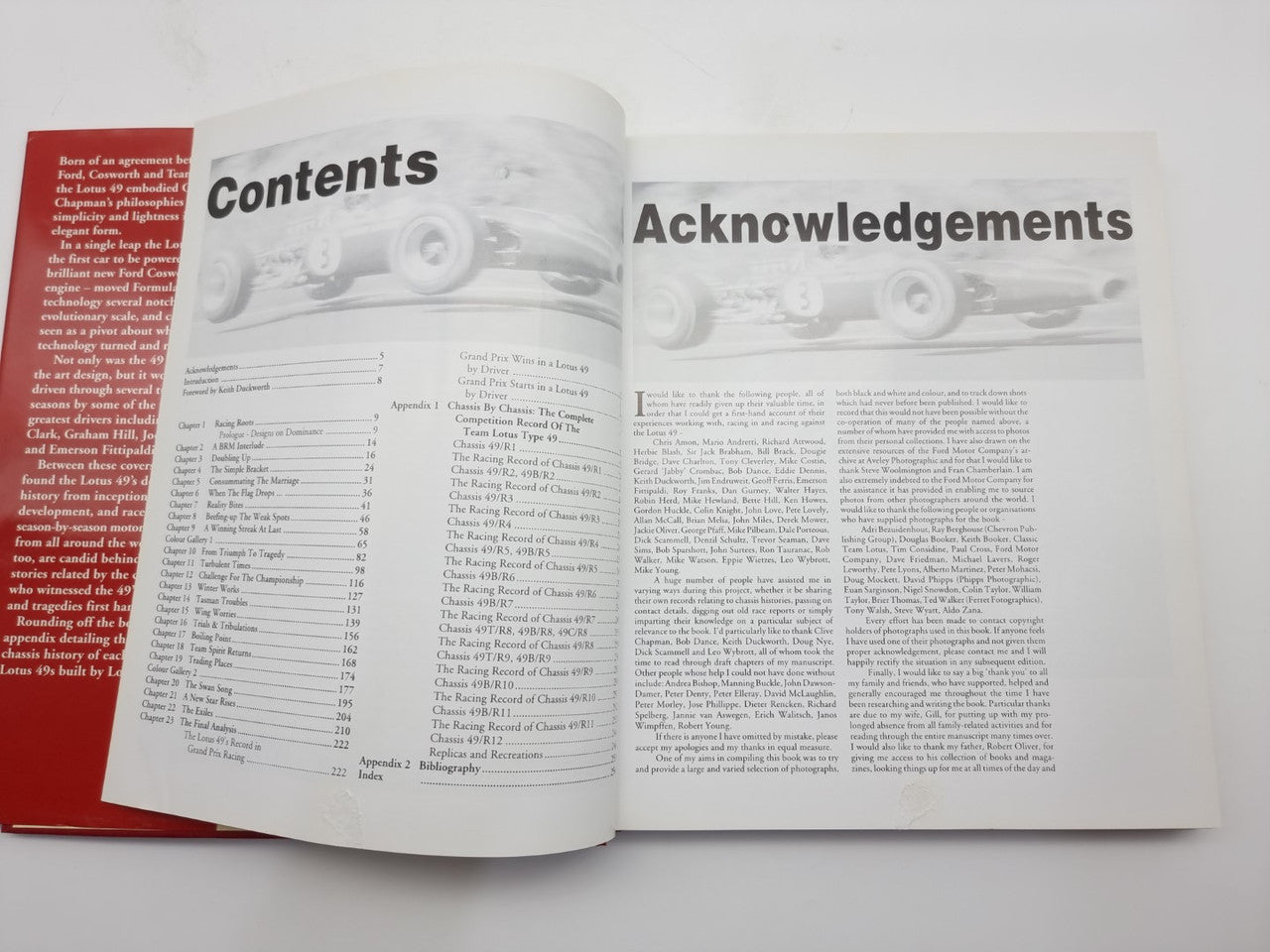 Open book with 'Contents' and 'Acknowledgements' sections on white pages