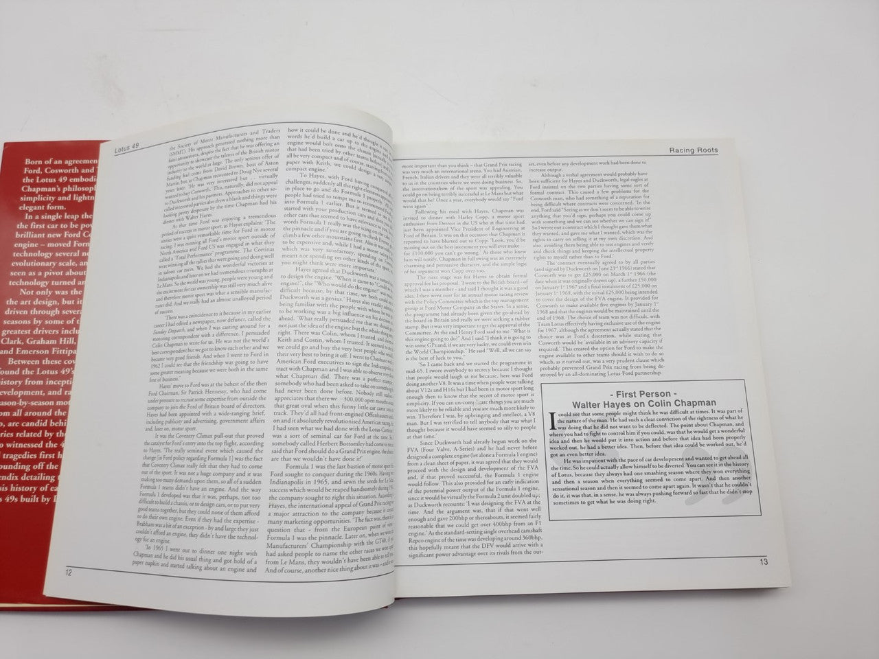 Open book with dense text columns and small caption box on white pages