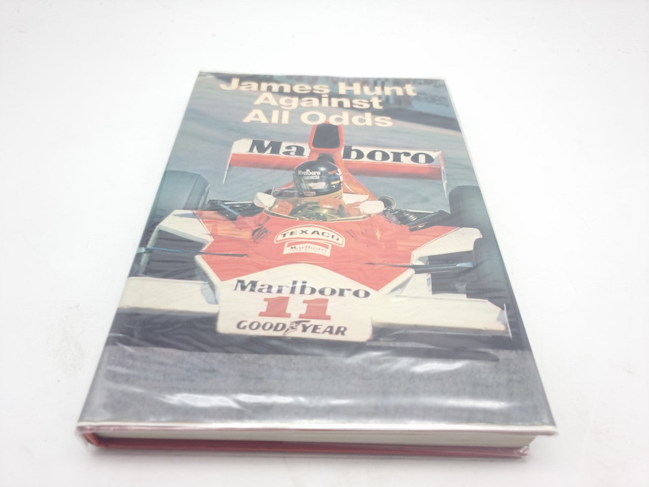 Signed James Hunt racing memoir book with color front cover and title text