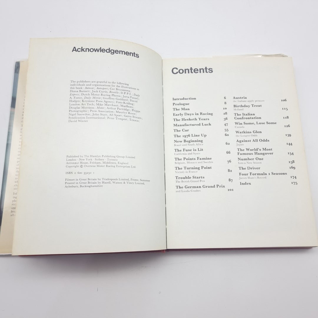 Racing memoir book with open pages showing Acknowledgements and Contents