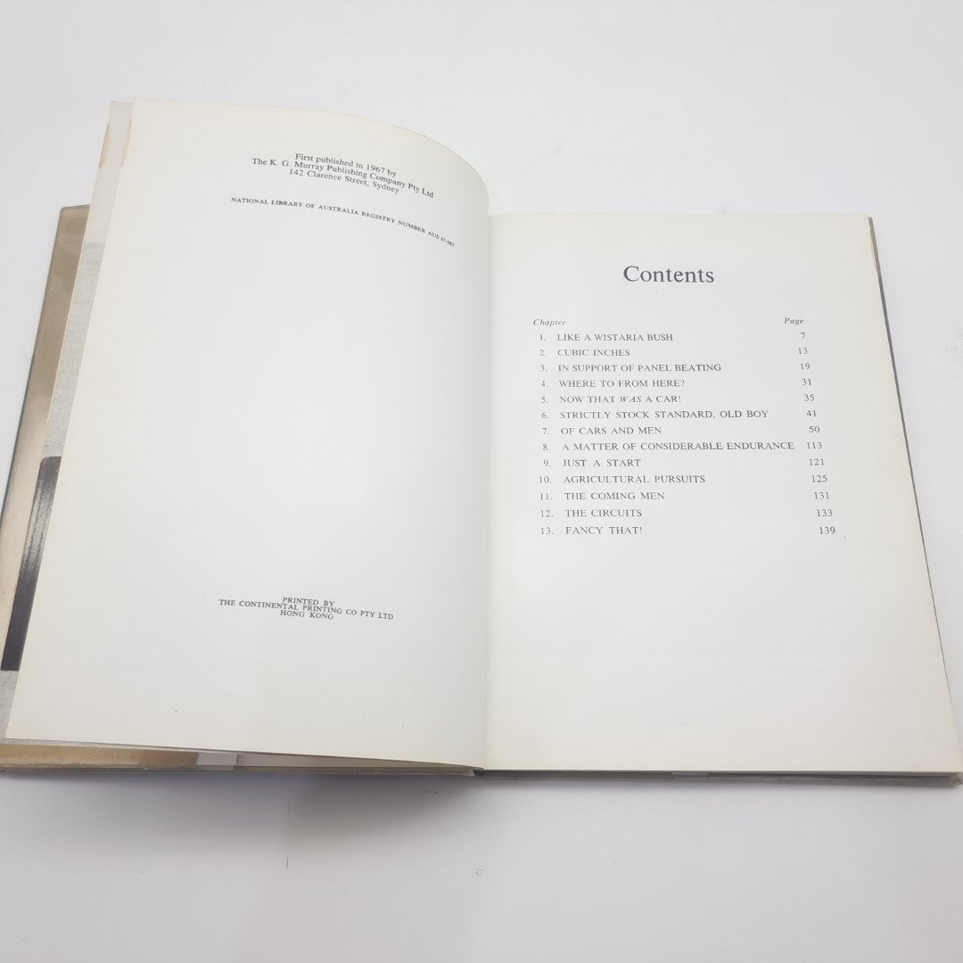 Motor race photography book opened to the contents page with section headings.