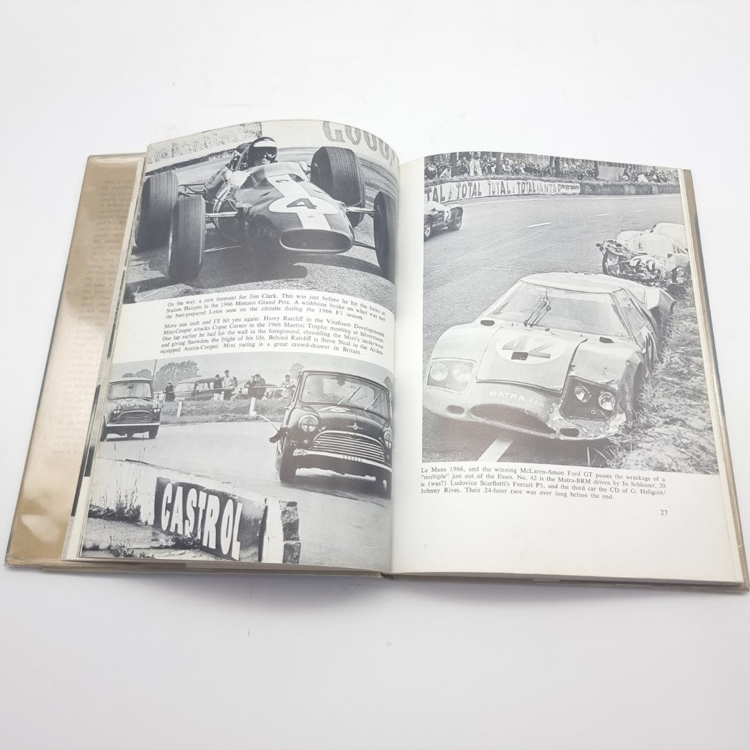 Motor race photography book opened to black-and-white racing car photo spreads and captions.