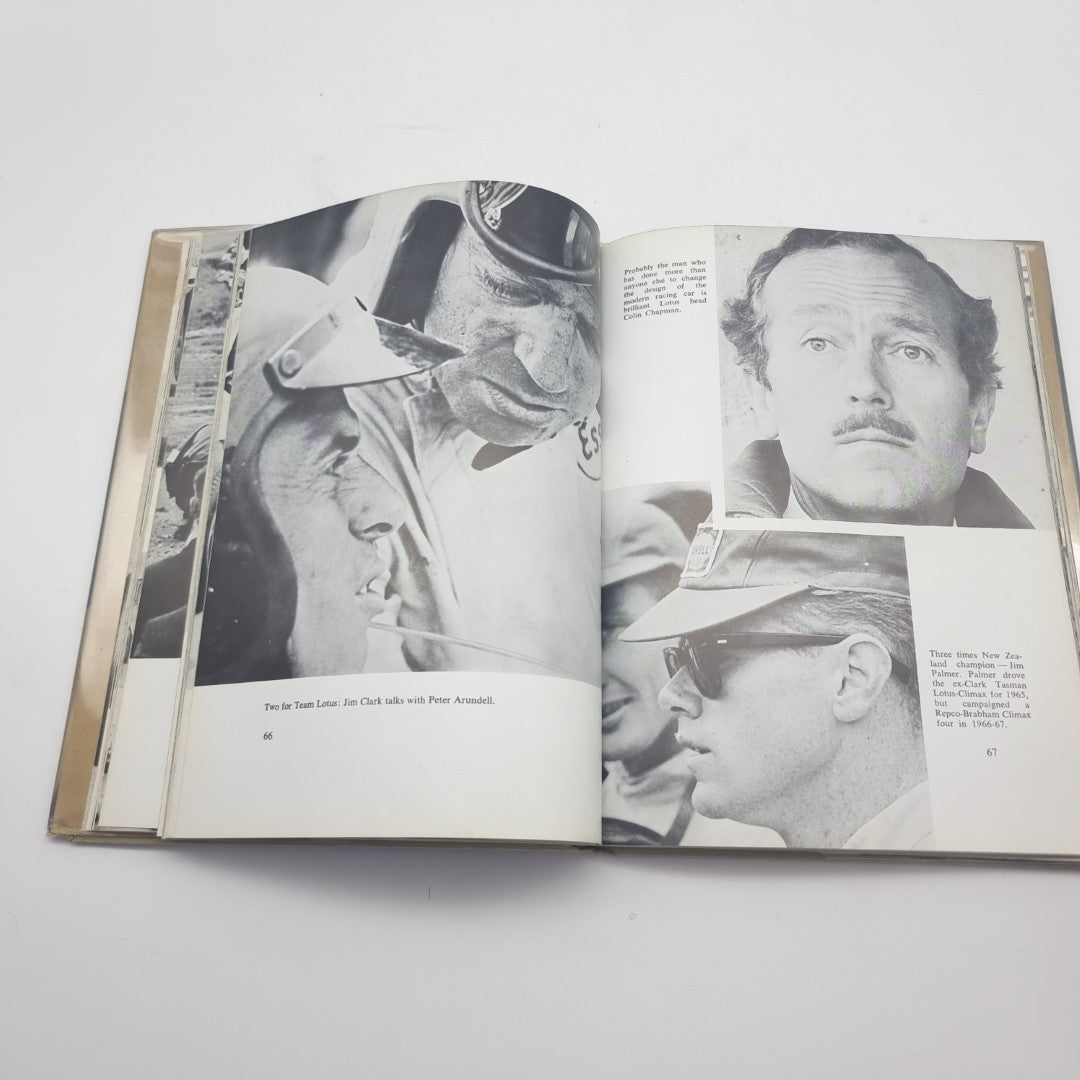 Signed motorsport photography book, open spread with black-and-white portrait photos