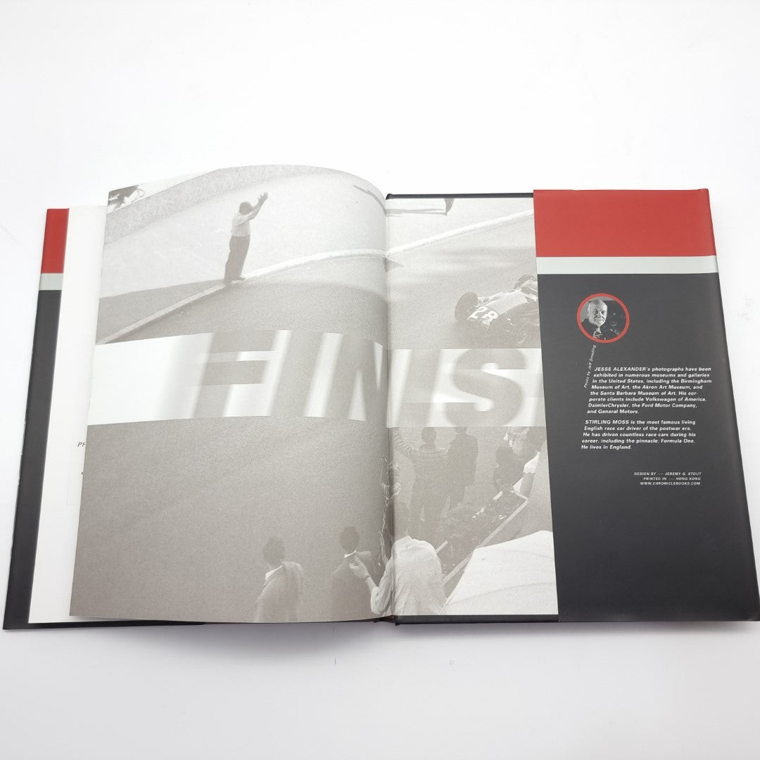 Racing photography book open spread with track action photo and red-accent text panel