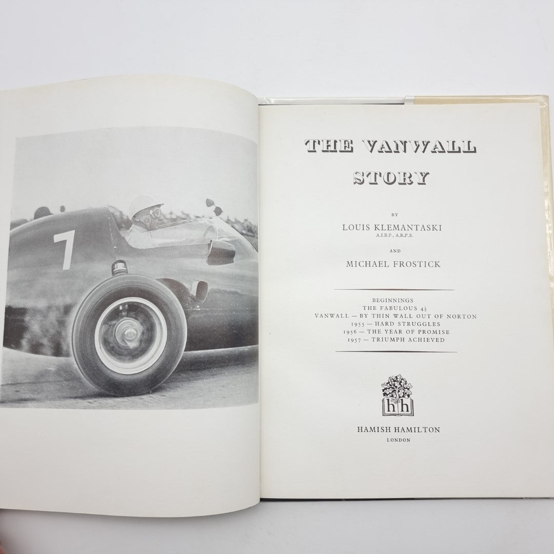 Vintage automotive book open to title page with authors and publisher marks