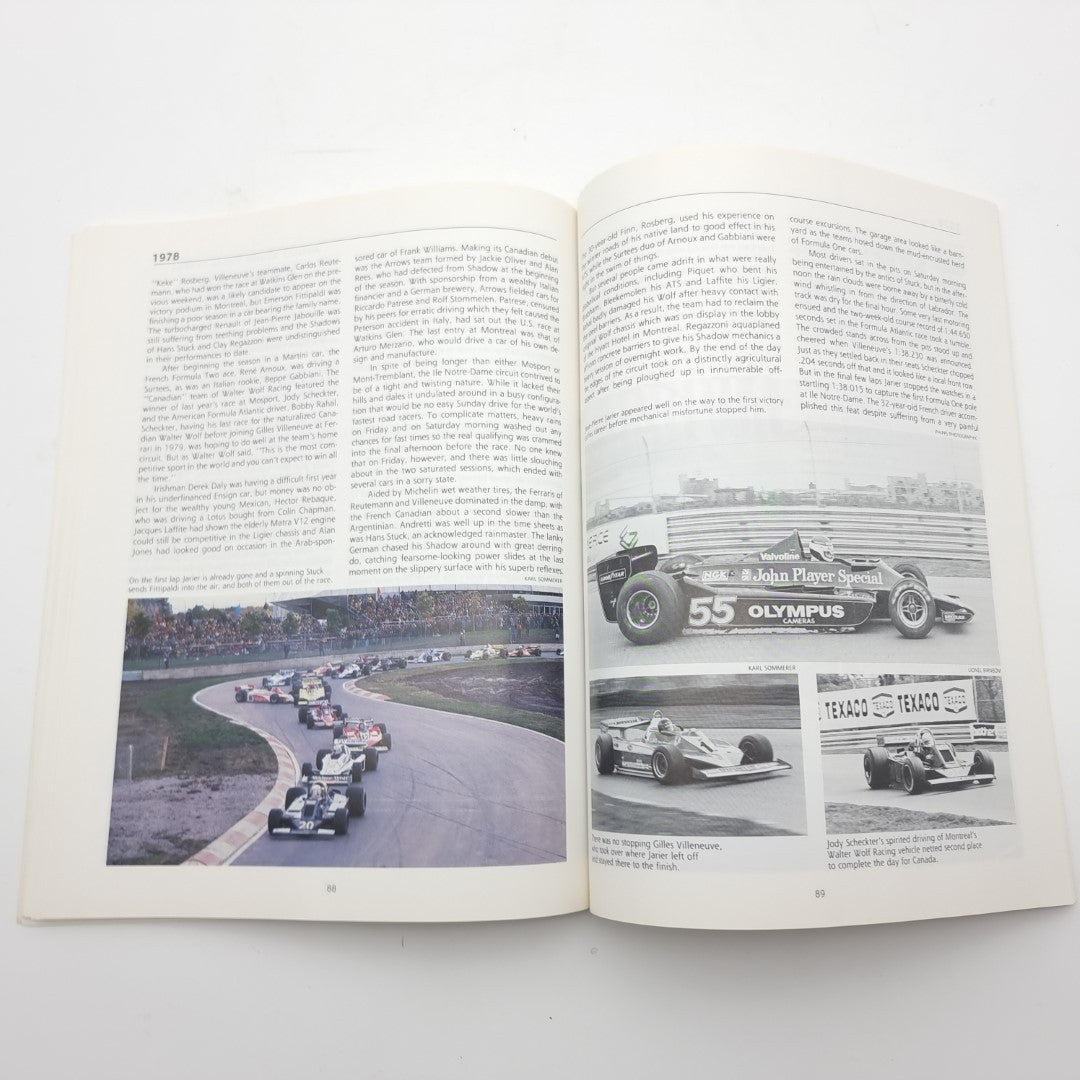 Open book spread with race track photo and two car close-up images