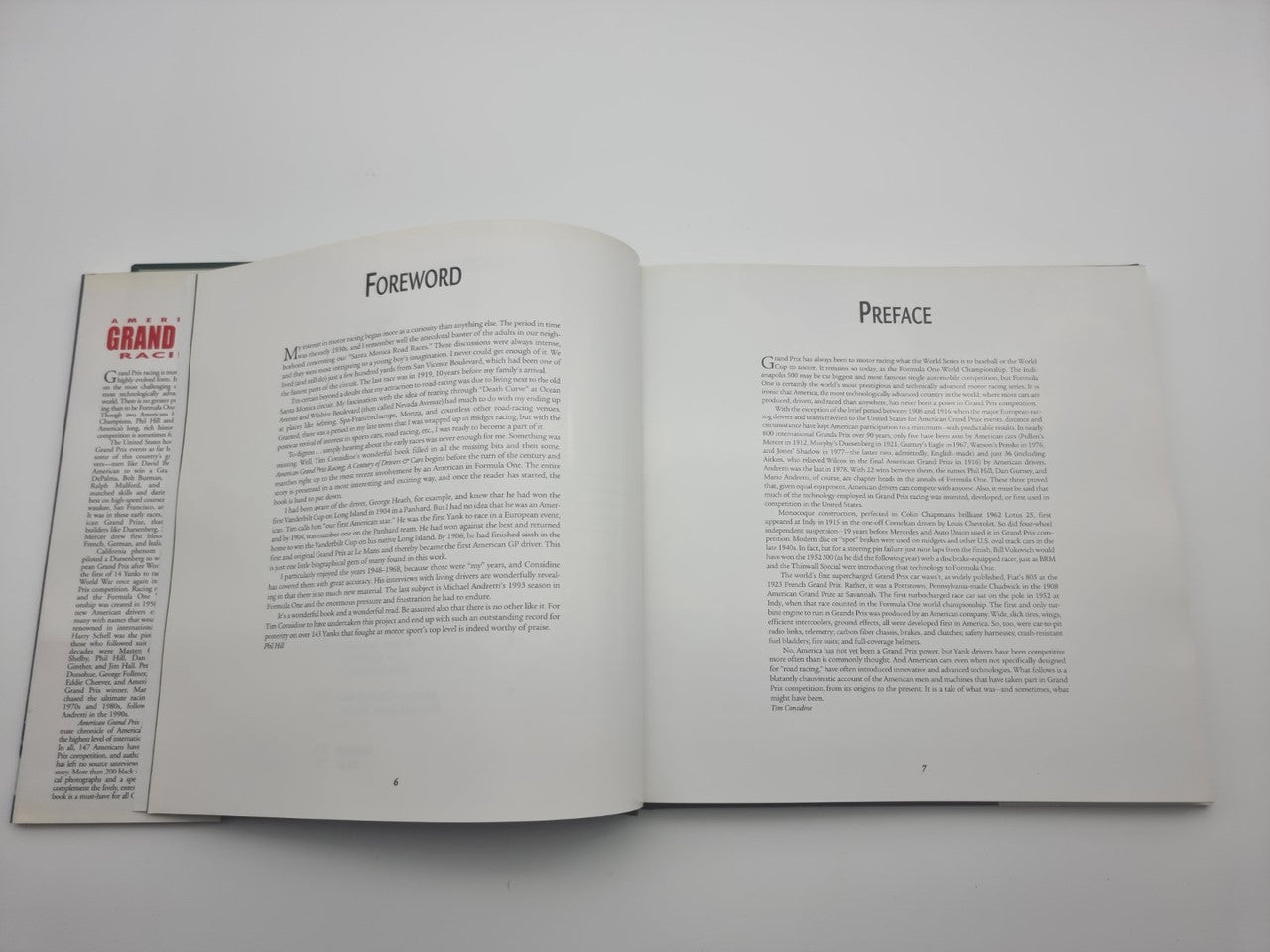 Open book showing "FOREWORD" and "PREFACE" text pages