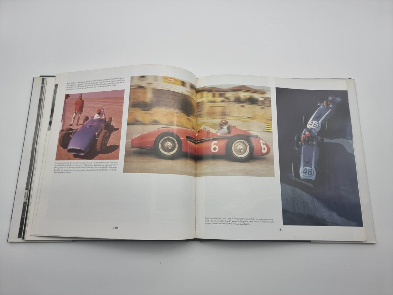 Open book spread with color car image and black-and-white action photo