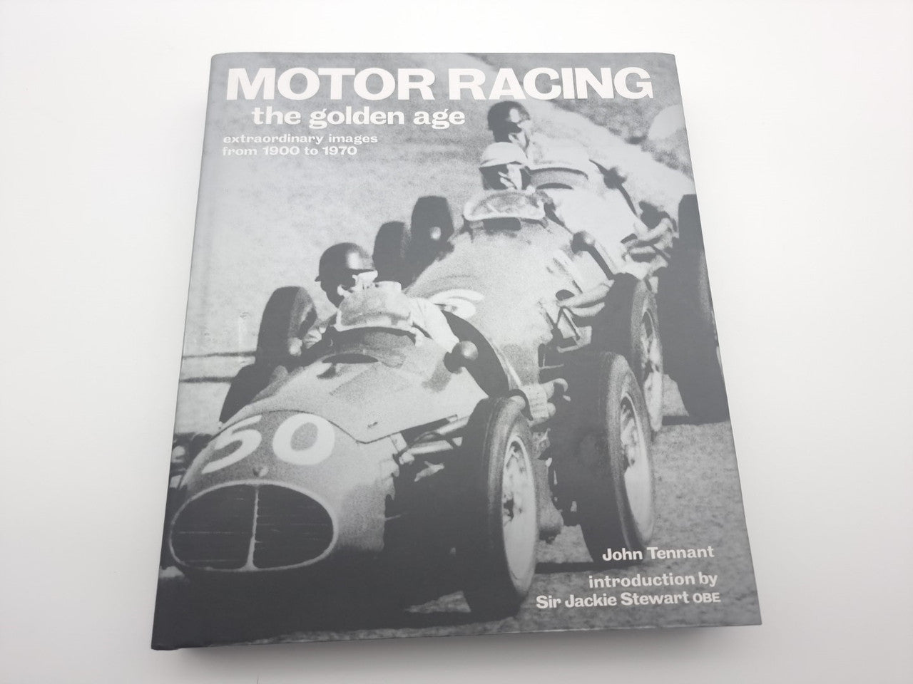 Motor racing photo book with vintage race car cover