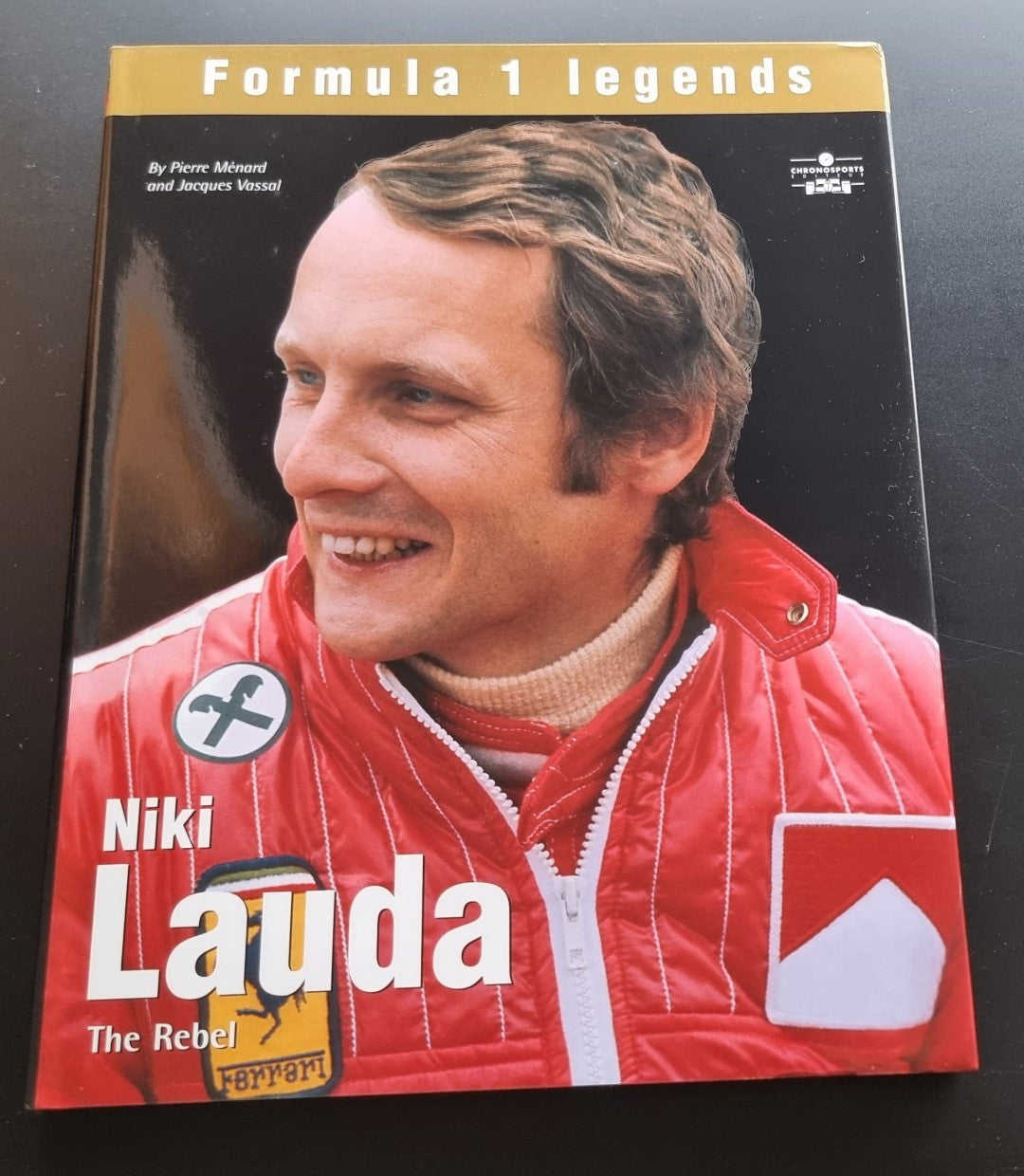 Niki Lauda race legend hardcover book with red jacket portrait on front cover