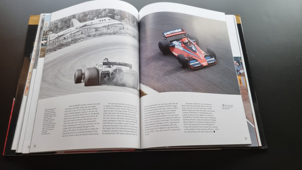 Open biography book showing monochrome car race photos and captions