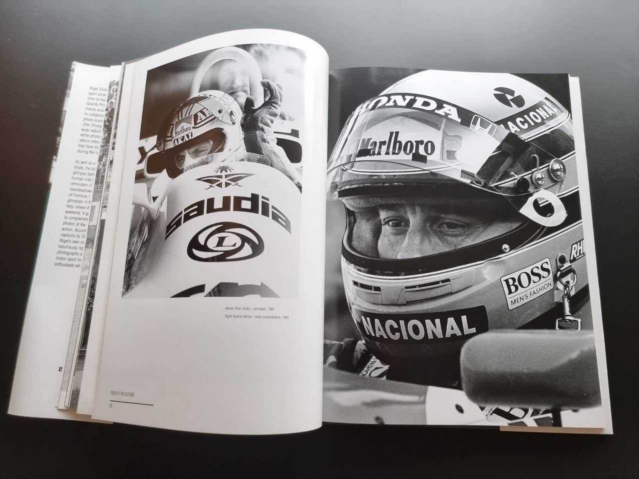 Open motor sport photography book with black-and-white portraits of helmeted drivers