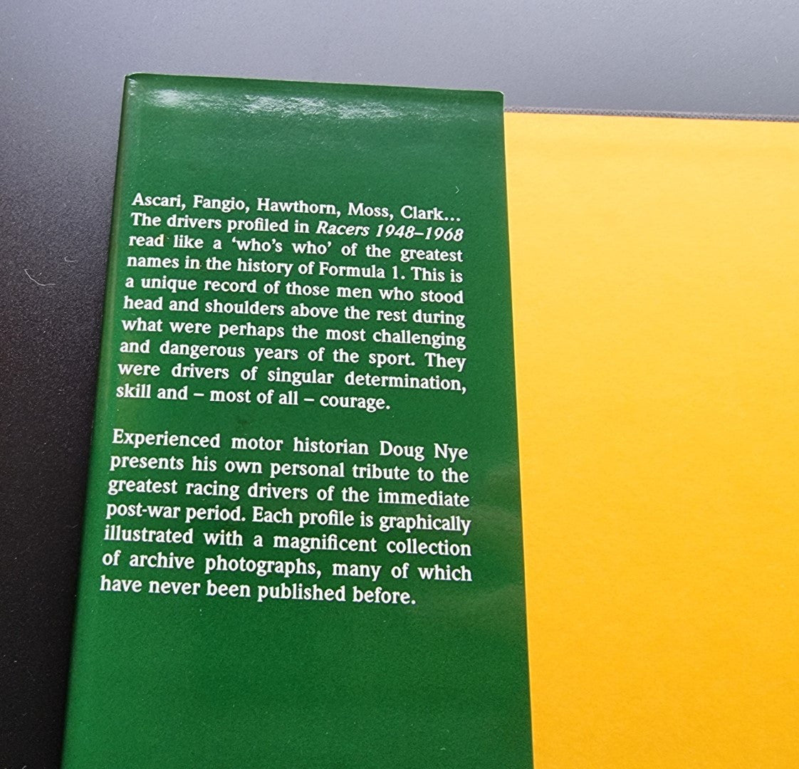 Green back cover of a hardcover racing book with paragraph text block.