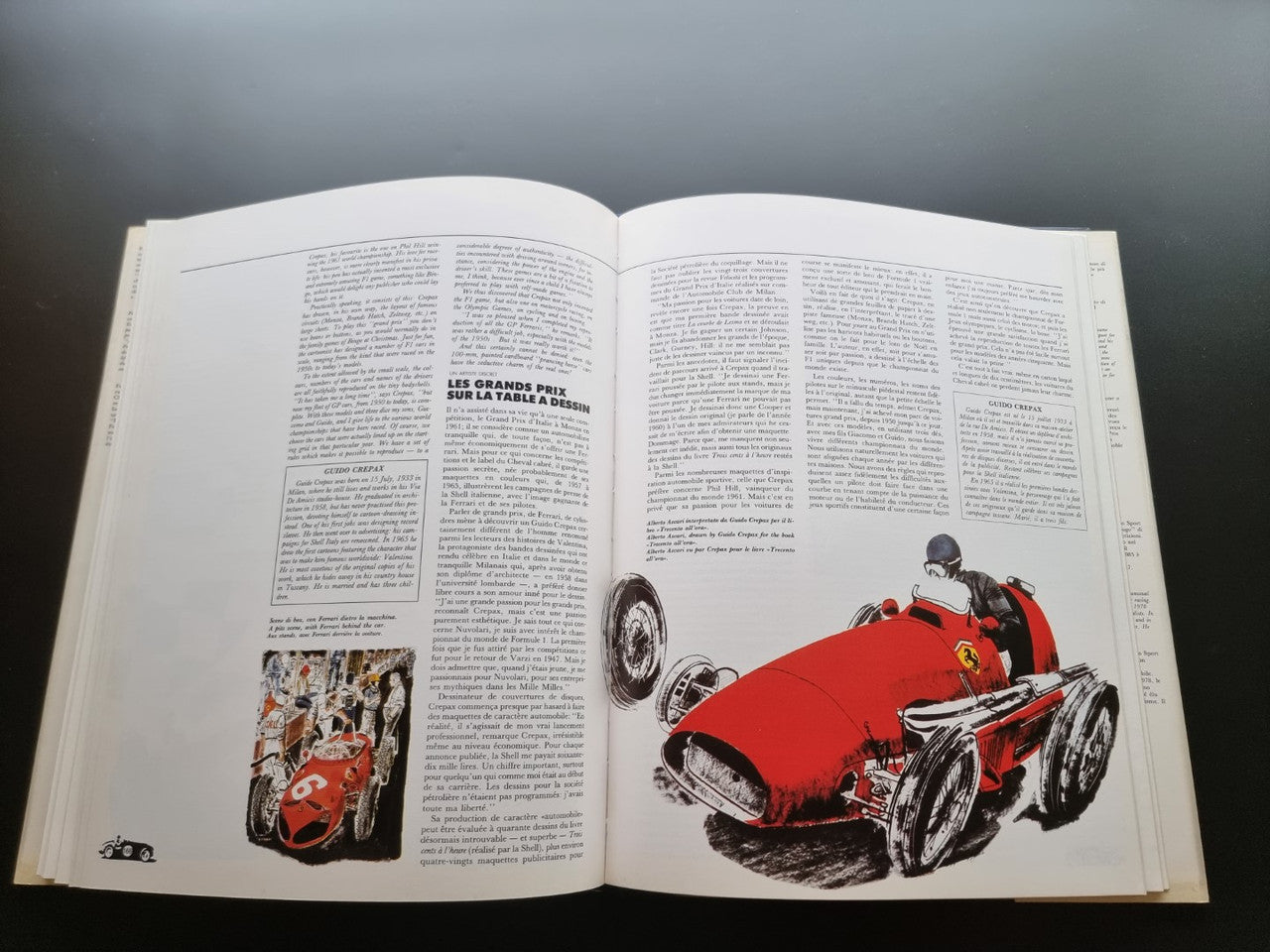 Open Ferrari year book with red race car illustration