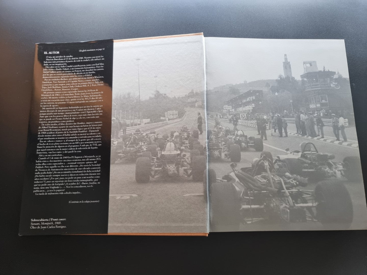 Open book with motorsport photos and paragraphs across both left and right pages