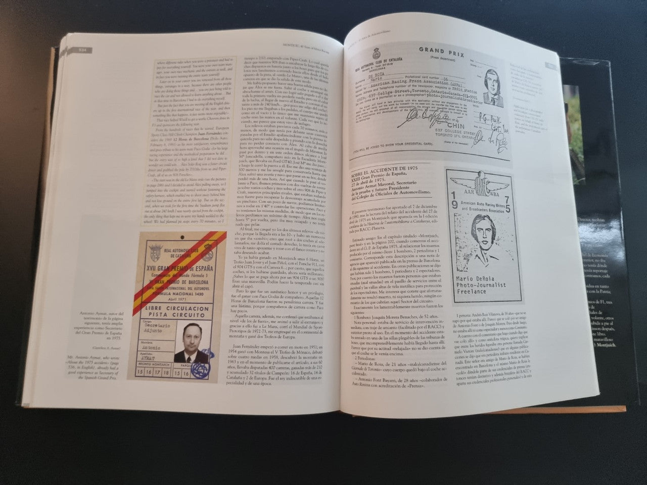 Open paperback book with text pages and diagrams, shown from an overhead angle