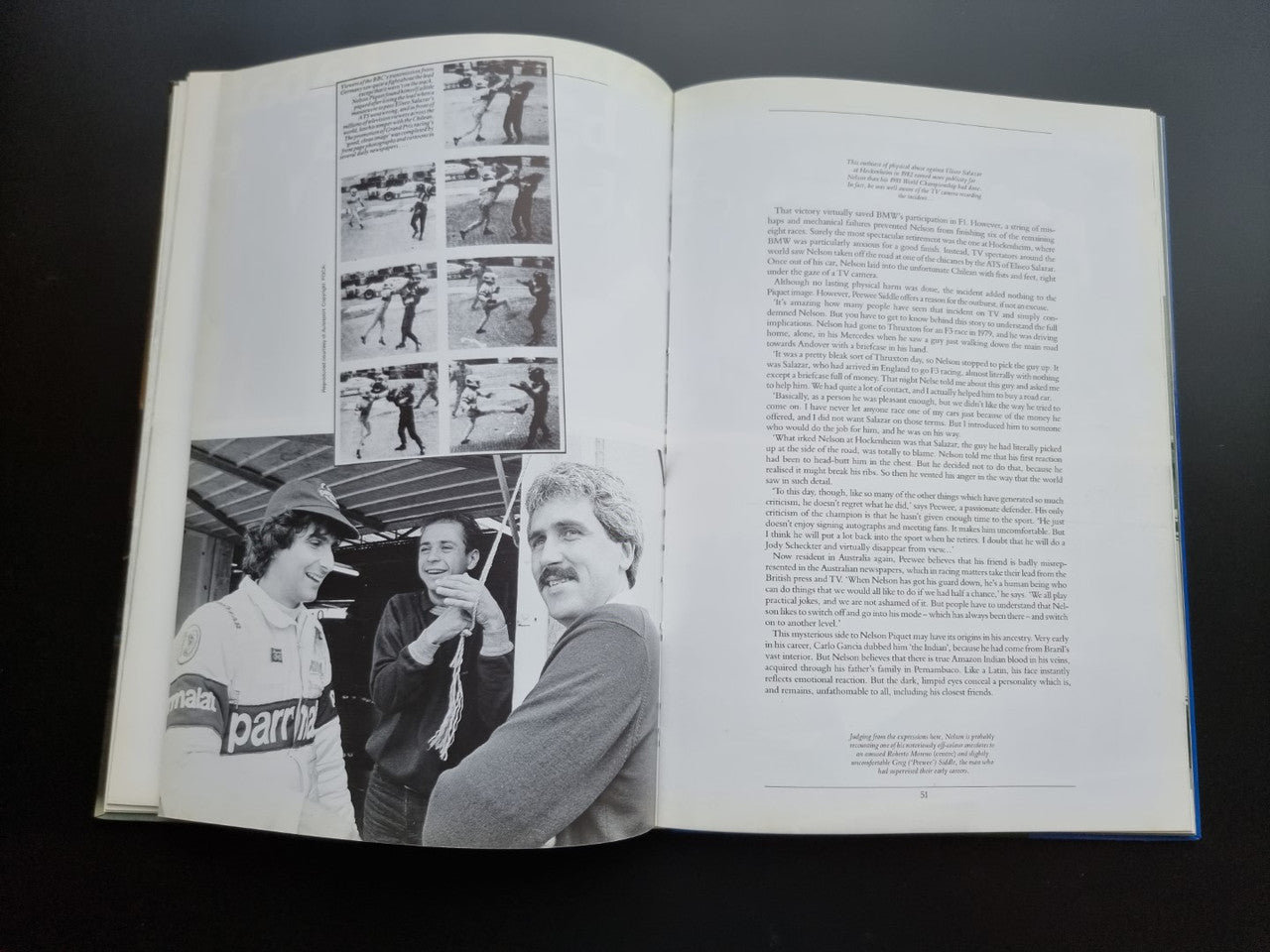 Open motorsport book pages with collaged black-and-white action photos