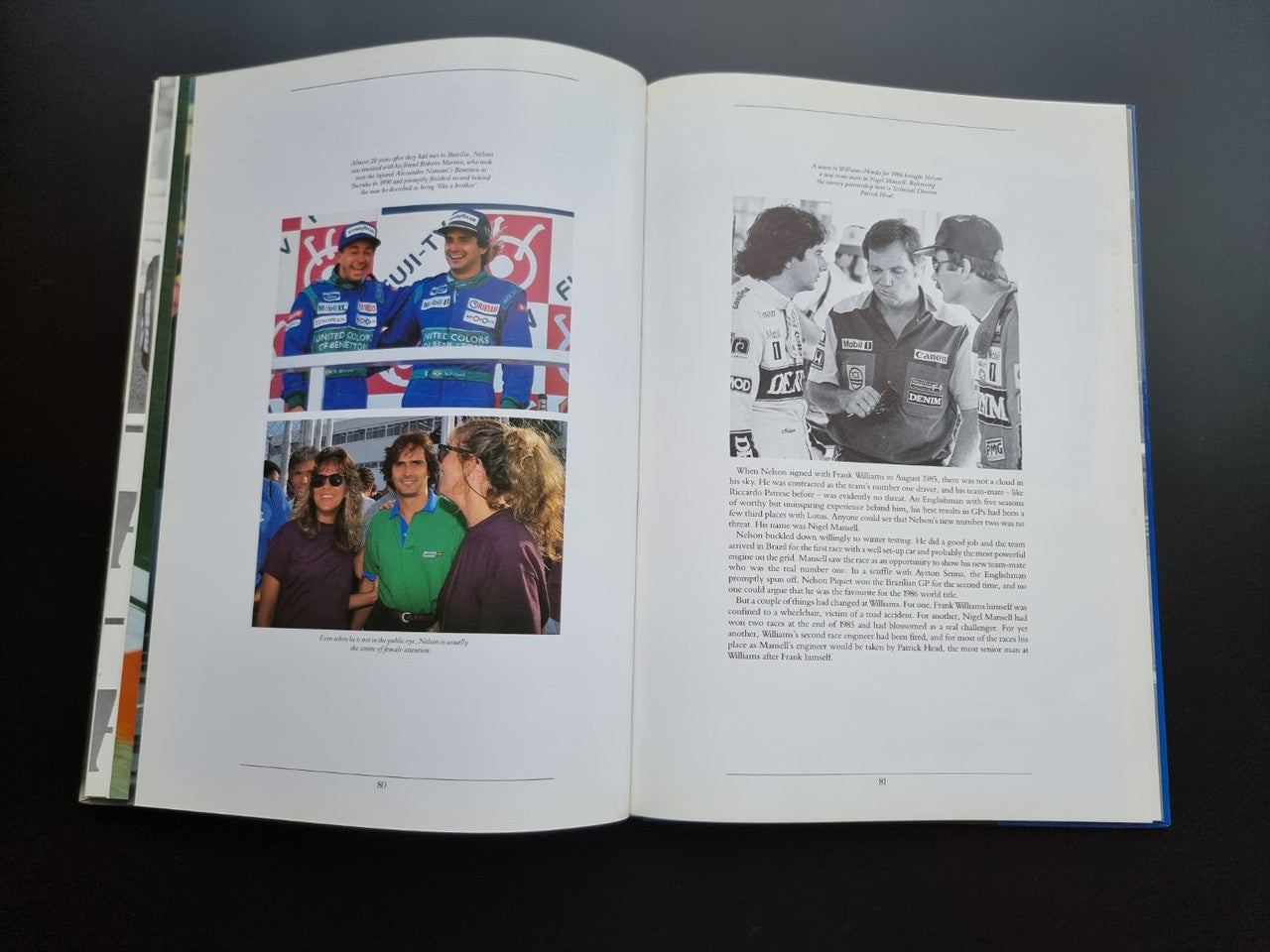 Open motorsport book pages with color photos and printed captions