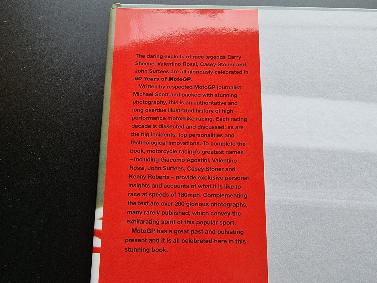 Paperback book back cover with dense white text and red border