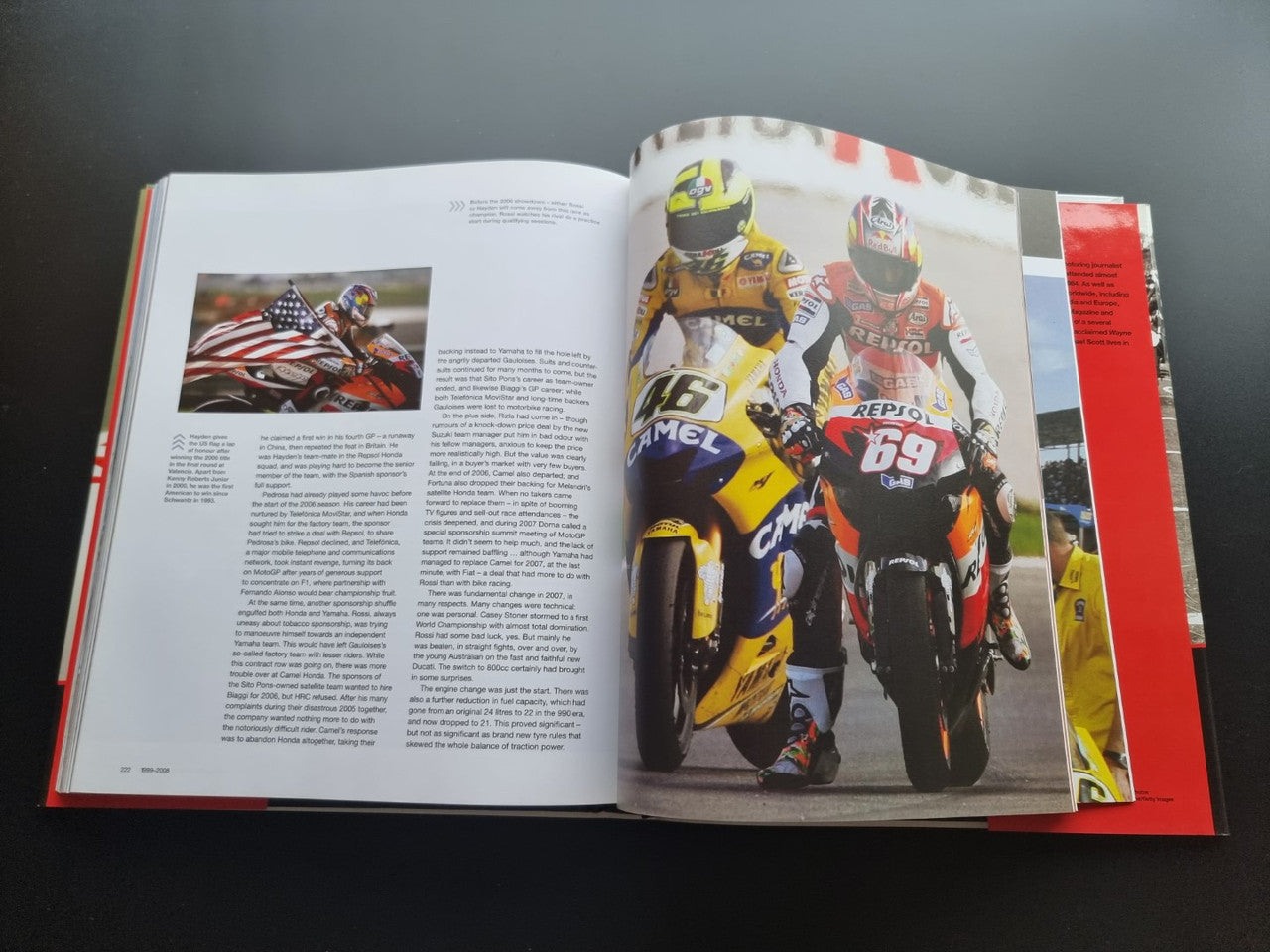 Motorsport history book, open spread showing two-page motorcycle racer photos and text